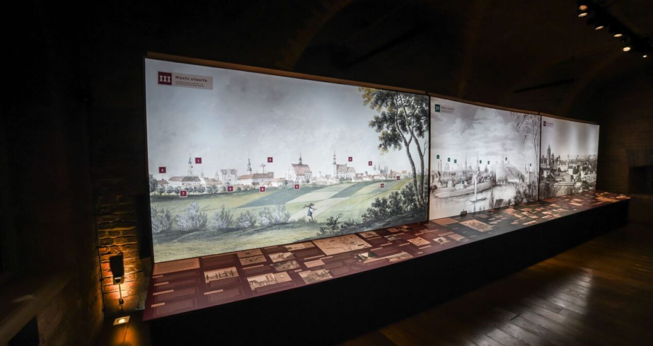 Zajmująca całą ścianę sali wystawowej grafika z historycznym widokiem na Poznań